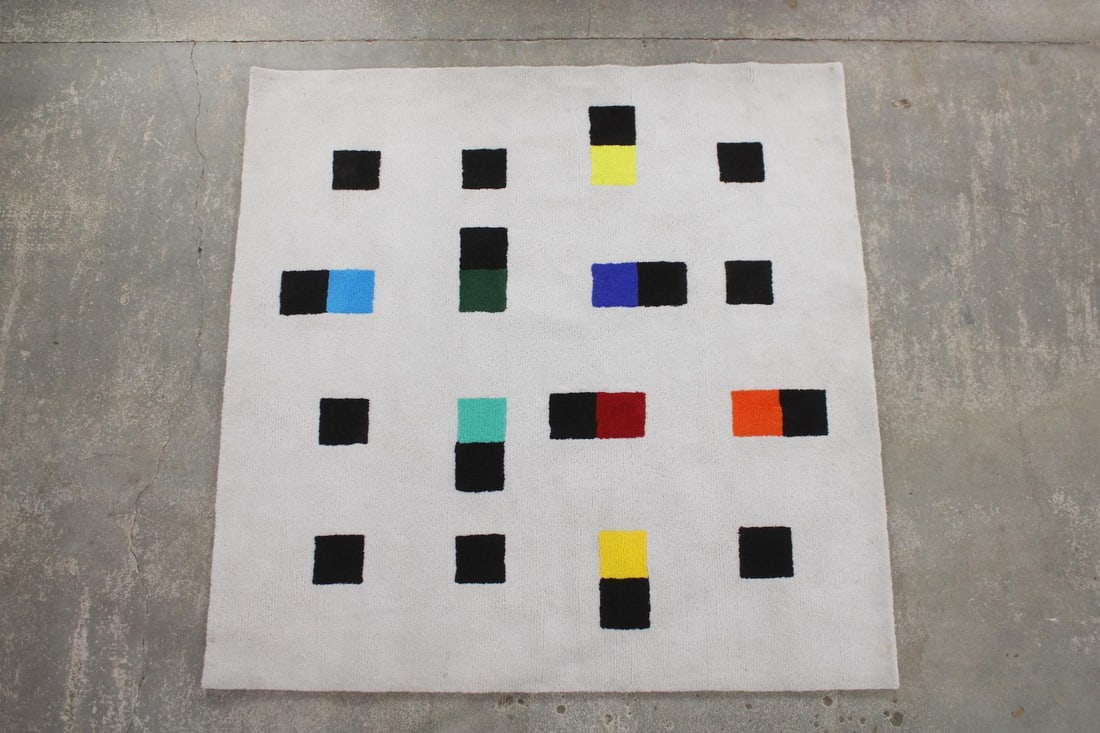 Max Bill Graphic Rug - Colorful Accents: Max Bill Graphic Rug - Colorful Accents. The max, biena + jakob bill foundation rug designed by Max Bill, based on graphic art. It is hand-crafted in Japan and the made of acrylic. This rug retails ne