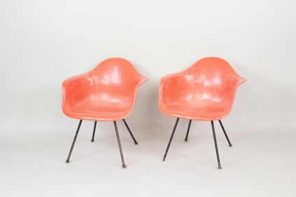 Pair of Orange Eames Herman Miller Fiberglass Shell Arm Chairs