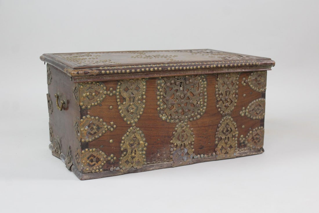 Brass Studded Decoration Hardwood Zanzibar Chest: Brass Studded Decoration Hardwood Zanzibar Chest. This chest has a fitted interior, brass decoration including handles. Dimensions are 12.75 in h x 25.5 in w x 16 in d. Condition is good, some metal c