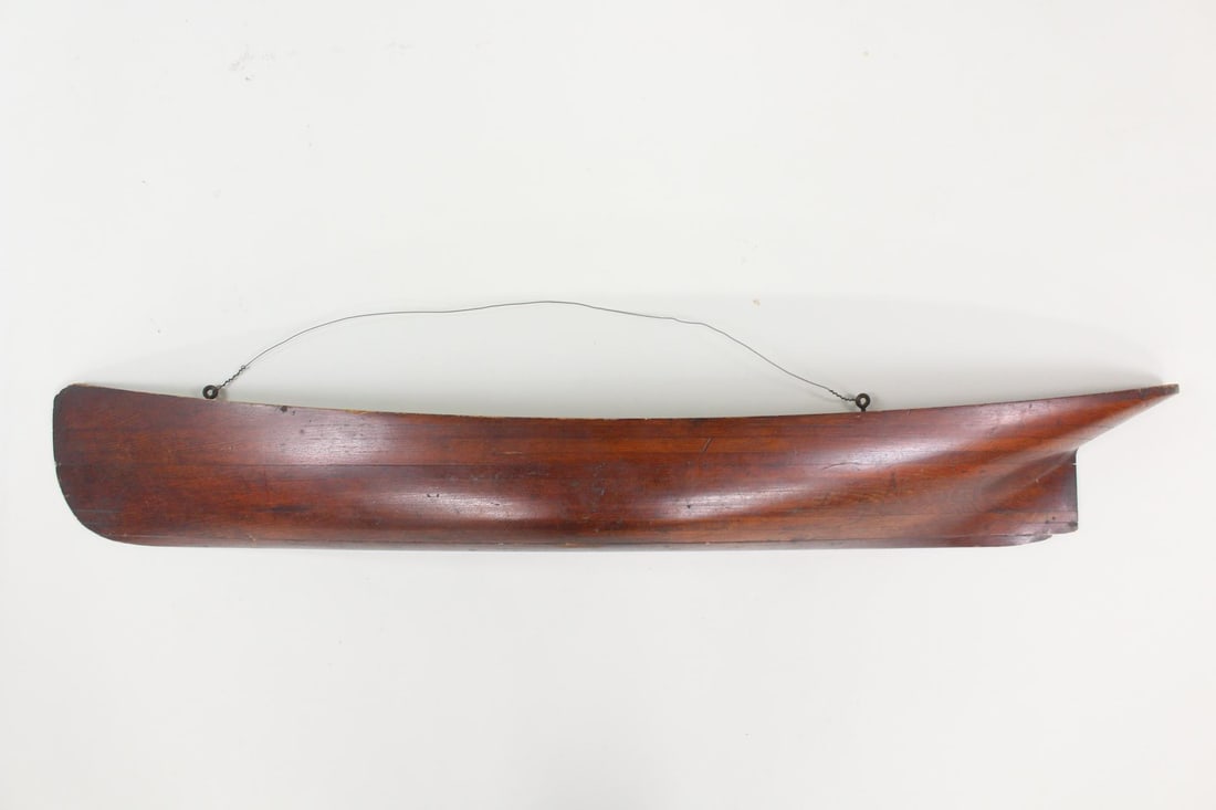 Antique Wooden Half Hull Boat Model, 4 ft Long: Large Antique Wooden Half Hull Boat Model, 4 ft Long, Wall Hanging, Sculpture. Nautical shipbuilder's model carved of wood, wired to hang. Dimensions are 7 in h x 48 in w x 5.5 in d. Condition is good