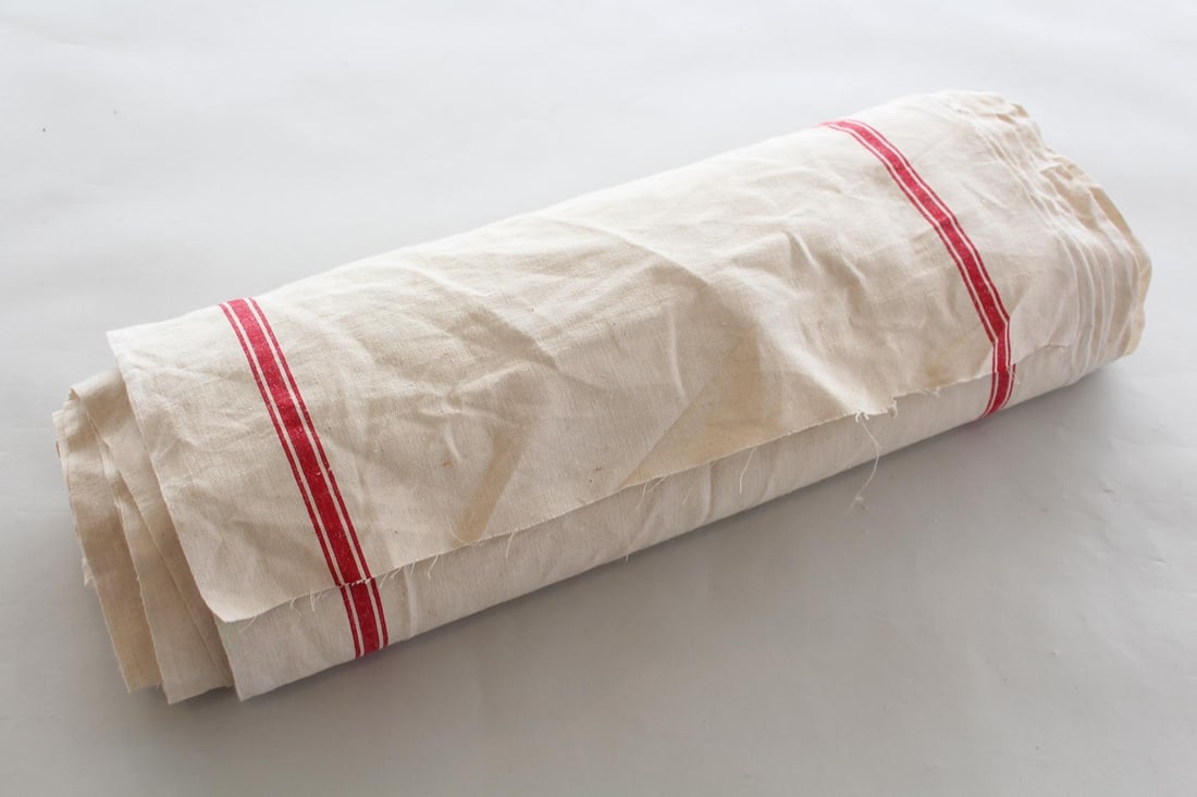 Uncut Roll of Red Stripe Grain Sack Fabric, Kitchen Textiles: Uncut Roll of Red Stripe Grain Sack Fabric, Kitchen Textiles. An approximately 100 ft roll of unused white and red stripe fabric, perfect for making red stripe French style napkins, towels and table r