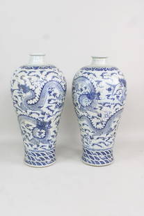 Pair of Chinese Blue and White Large Floor Vases, Dragon Motif: Pair of Chinese Blue and White Large Floor Vases, Dragon Motif. These are large sized floor vases, decorated with Dragon decorations. Dimensions are 39 in h x 18.5 in w x 18.5 in d. Condition is very