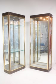 Pair of Paul M. Jones Bronze and Glass Curio Cabinets