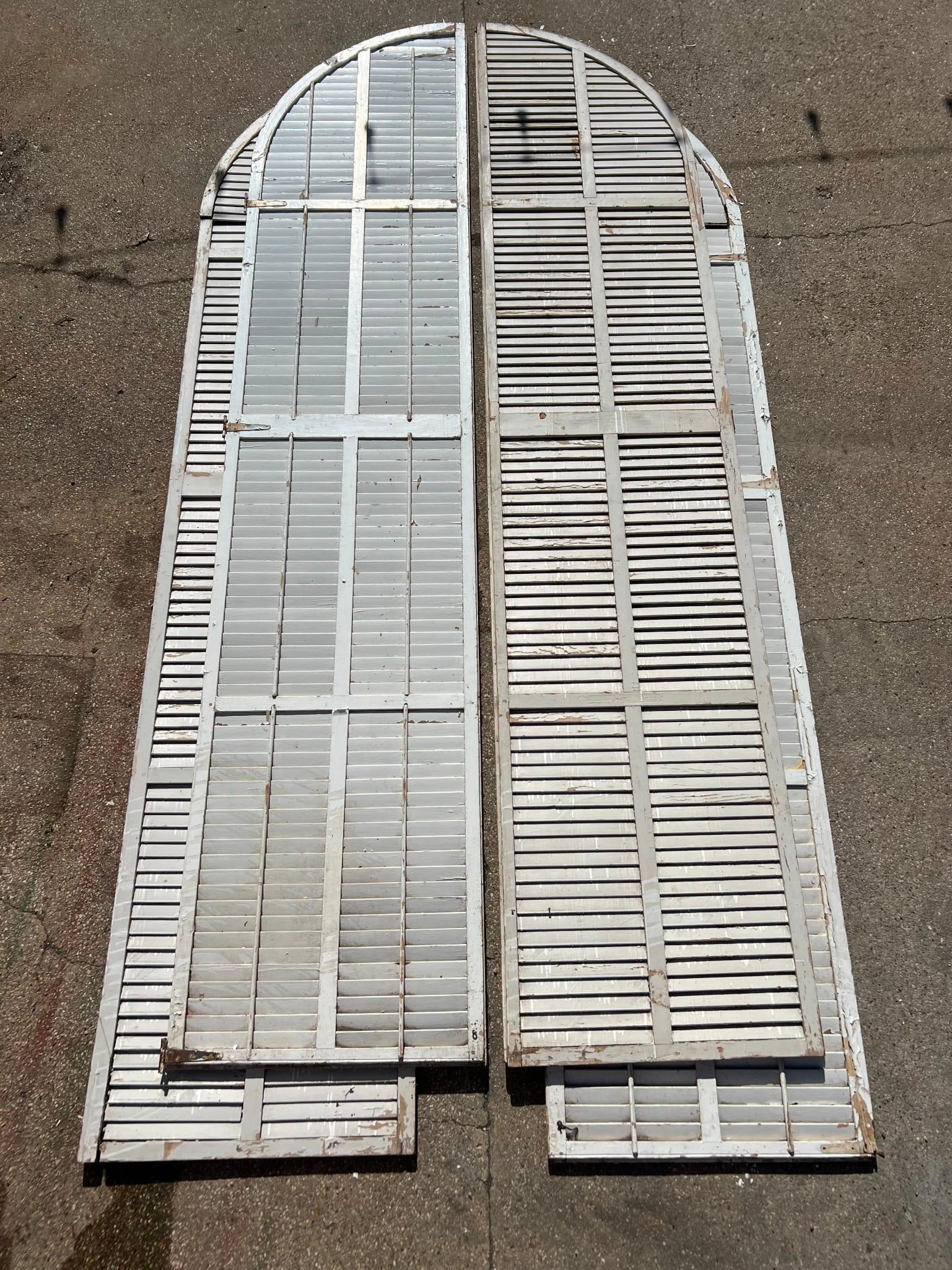 Set of 4 Huge 13ft Tall Arched Top Architectural Shutters: Set of 4 Huge 13ft Tall Arched Top Architectural Shutters. This lot consists of two pairs of shutters, very very tall shutters. Dimensions are 160 in h x 33 in w x 1.5 in d. Condition is fair, one shu