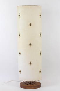 Mid Century Modern Cylindrical Lamp with Brass Diamonds: Mid Century Modern Shade & Brass Diamond Cylindrical Lamp. This lamp has wooden base and the rest is one big shade with brass diamond shaped fasteners. Dimensions are 44.5 in h x 13 in w x 7.5 in