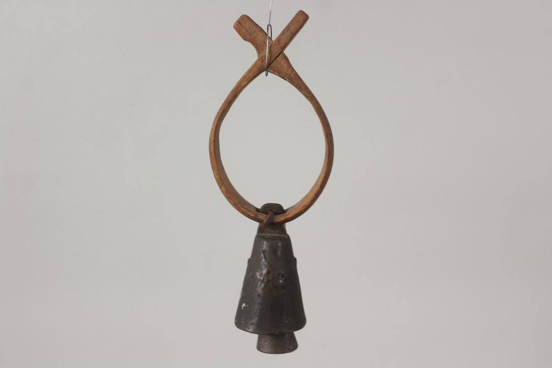 Bronze Goat Bell with Wood Collar, Wind Chime Bell: Bronze Goat Bell with Wood Collar, Wind Chime Bell. This wind bell has the brutalistbell design similar toSoleri bell. This appears to be an antique goat bell that someone turned into a wind chime bel