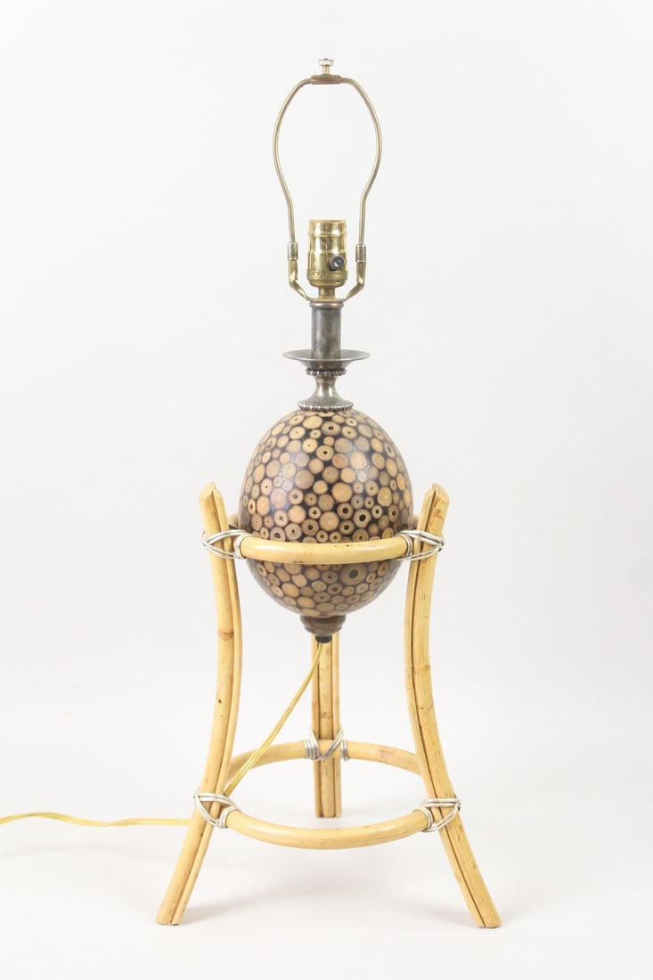 Maitland Smith Bamboo Orb Lamp in Bamboo Stand: Bamboo Orb Lamp in Bamboo Stand. Unusual table lamp with a spherical body made of sliced bamboo, held in a bamboo stand. Maitland Smith label attached. No shade. Dimensions are 28.5 in h x 11 in w x 1