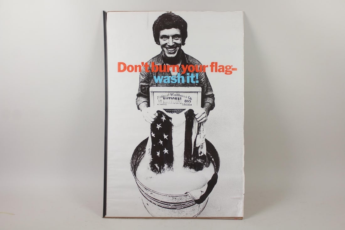 1970s Washboard Ad Poster "Don't Burn Your Flag America Wash It": 1970s Washboard Ad Political Poster "Don't Burn Your Flag America Wash It". Poster by George Lois & photographer Carl Fischer was an advertisement for the National Washboard Co. Dimensions are 35.5 in
