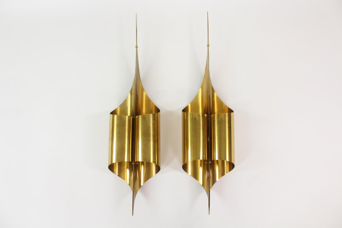 Pair of Maison Charles Wall Sconces: Pair of Maison Charles Wall Sconces. Matching pair of sconces with pointed tips made of what appears to be brass. They are unmarked but most definitely Maison Charles sconces. Dimensions are 38.5 in h