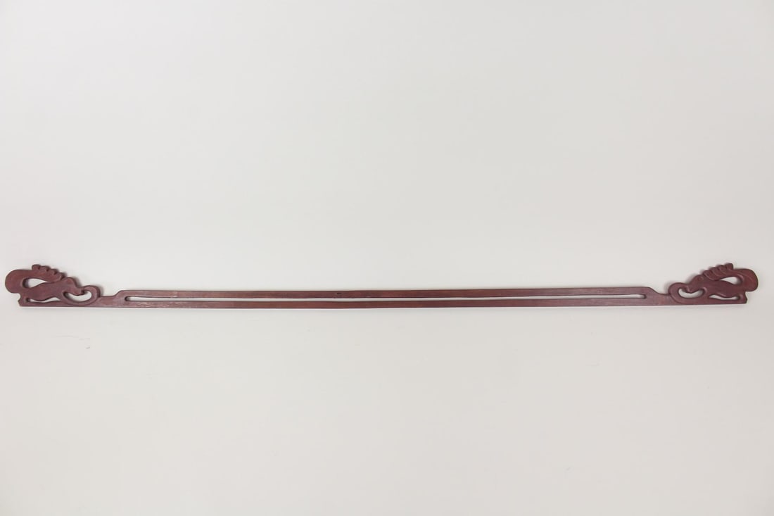 Asian Carved Wood Tapestry Hanger with Animal Details: Asian Carved Wood Tapestry Hanger with Animal Details. Wide and thin carved wood tapestry hanger with an animal, perhaps a dragon or squirrel, at each end. Dimensions are 3.5 in h x 62 in w x .75 in d