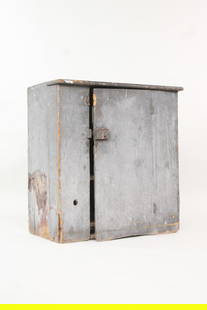 Painted Grey Primitive One-Door Low Cupboard: Painted Grey Primitive One-Door Low Cupboard. Nice sized single door cupboard, it has cubby like compartments inside. Great milk painted surface. Dimensions are 38 in h x 36.5in w x 19.5 in d. Conditi