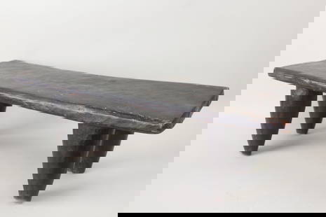 Carved Wood African Senufo Stool Bench, Black Finish: Carved Wood African Senufo Stool. Low stool made of carved wood, representative of the Senufo people of West Africa. Could be used as a footstool, display pedestal or bench. Dimensions are 12 in h x 3