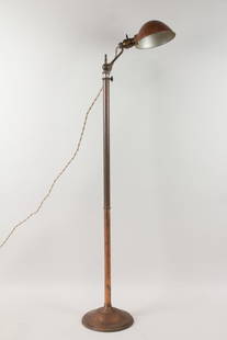 Industrial Copper Bradley & Hubbard Floor Lamp: Industrial Copper Bradley & Hubbard Floor Lamp, believed to be Bradley & Hubbard. This two-tone metal standing light has a curved neck and shell shaped shade with pull chain switch, and adjustable hei