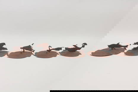 Set of 5 Iron Bird & Fish Silhouette Metal Sculptures: Set of 5 Iron Animal Silhouette Sculptures. Five sculptures with silhouettes of a fish, eagle,shark, peacock and a bird or seal mounted on round discs. Nice rusty patina. Dimensions are 3 in h x 5.5 i