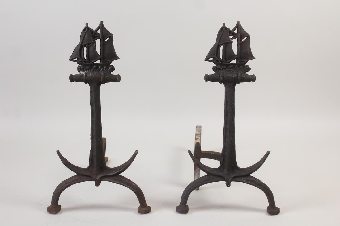 Cast Iron Nautical Ship Andirons: Cast Iron Nautical Ship Andirons. These have replaced back iron pieces. Dimensions are 18.75 in h x 10 in w x 16.5-19 in d. Condition is good. They have relpaced mismatched back iron pieces. Please ca
