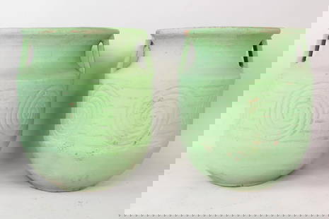 Pair of Large Green Painted Terracotta Garden Planter Urns: Pair of Large Green Painted Neoclassical Terracotta Urns. Matching pair of urns with impressed spiral designs and 2 handles. Dimensions are 26 in h x 20 in w x 21.5 in d. Condition is good with 2 chip