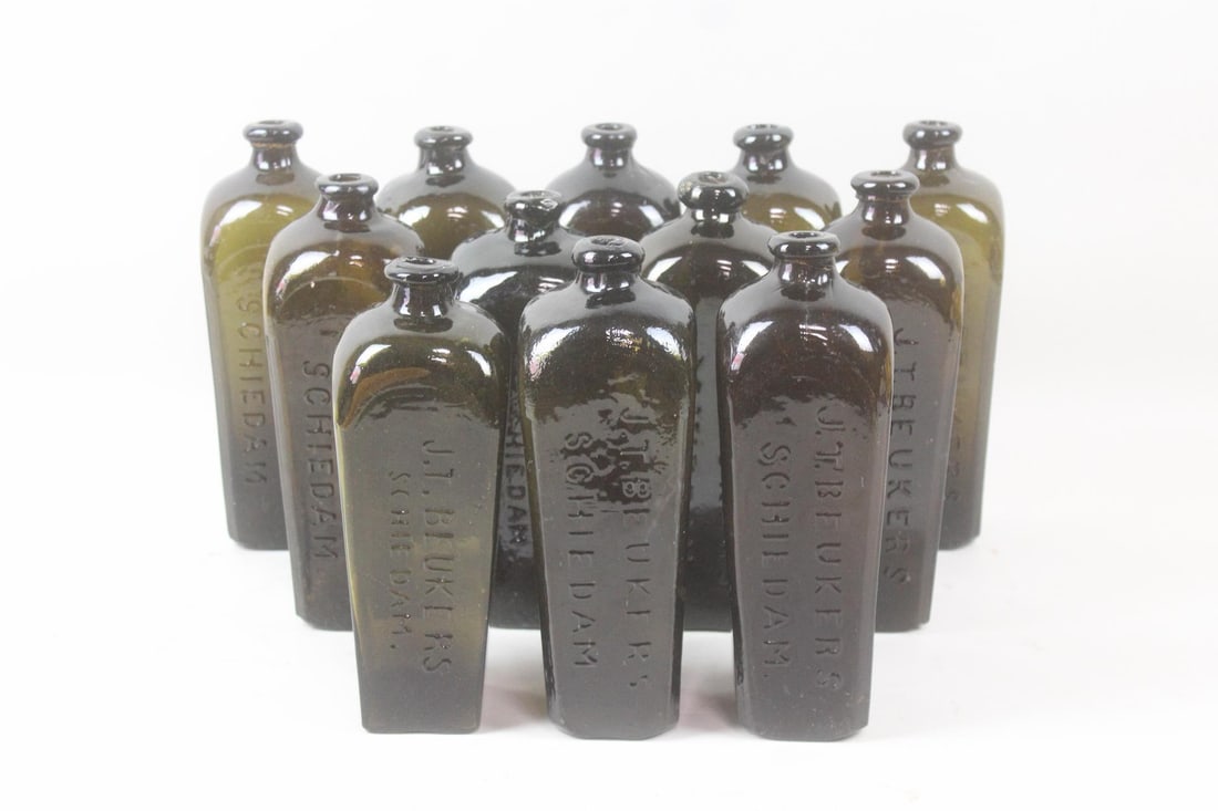 Lot of 12 Olive Green Glass Square Bottles, JT Beukers Schiedam: Lot of 12 Olive Green Glass Square Bottles, JT Beukers Schiedam. This is a nice collection of these bottles, the previous owner painted letters on some of them, this can be removed. A few of them stru