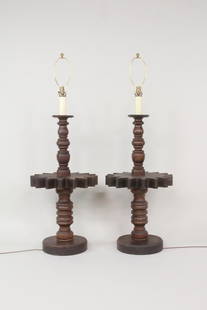 Pair of Industrial Wooden Cog Wheel Floor Lamps: Pair of Industrial Cog Wheel Floor Lamps. Matching pair of lamps made of turned wood. Dimensions are 59 in h x 20 in w x 20 in d. Condition is good with surface wear. No shades. The lamps have not bee