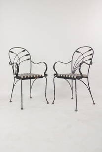 Pair of Art Nouveau Wrought Iron Outdoor Patio Chairs, Leaf Motif: Pair of Art Nouveau Wrought Iron Outdoor Garden Patio Chairs, Leaf Motif. Matching pair of chairs with wrought iron frames, striped black & white seats and leaf motif backs. Nice flowing form. 
