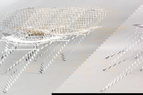 Set of 6 Mid-Century Modern Harry Bertoia Side Chairs: Set of 6 Mid-Century Modern Harry Bertoia Side Chairs. This set was used outdoors.. Mismatched set with white and black base. Dimensions are 28.5 in h x 21 in w x 23 in d. Seat height is 17.5 in. Cond