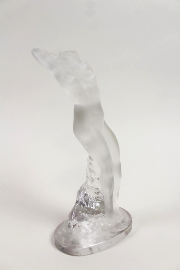 Lalique "Danseuse Bras Leves" Crystal Figure: Lalique Danseuse Bras Leves Crystal Nude Female Figure. Beautiful frosted & clear glass figurine, Danseuse Bras Leves (Dancer Arms Up), designed by Marc Lalique. Marked Lalique France. Dimensions are 
