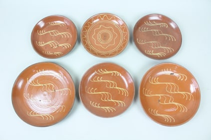 Group of 6 Slip Decorated Redware Plates