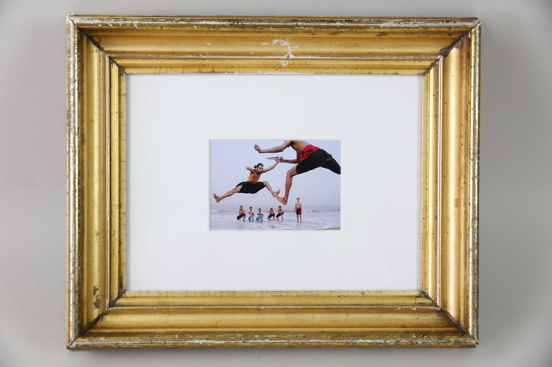 Raghu Rai Photograph, Kalari Practice in India, Magnum Print: Raghu Rai Photograph, Kalari Practice in India, 2017. A color photograph entitled "Practicing Kalari on the beach of Cochin, Kerala, India," this image by photographer Raghu Rai (Indian, b. 1942) depi