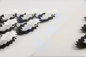 Set of 6 Rosenthal Porcelain Variation Cups & Saucers by Tapio Wirkkala: Set of 6 Rosenthal Studio Linie Cups & Saucers by Tapio Wirkkala. Striking, minimalist set of coffee or tea cups designed by Finnish designer Tapio Wirkkala for the Rosenthal Studio Linie. Black porce