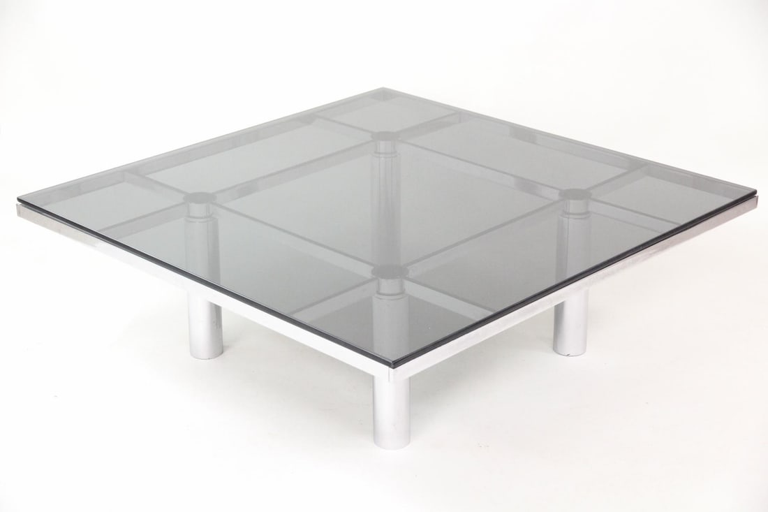 Tobia Scarpa Andre Smoked Glass & Chrome Coffee Table: Mid-Century Modern Tobia Scarpa Andre Smoked Glass & Chrome Coffee Table. Andre Smoked Glass Low Table designed by Tobia Scarpa, with chrome finished frame, smoked glass top and leather pads supportin