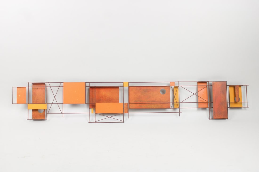 Abstract Metal Wall Sculpture by Peter Pepper Products: Mid-Century Modern Metal Wall Sculpture by Peter Pepper Products. An elongated composition of geometric forms and lines, crafted from patinated and orange colored metal. Signed with decal manufacturer