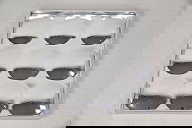 Turner Space Age Convex Metal Bubble Mirror: Space Age Mid-century Modern Convex Bubble Mirror. Nine panel convex metal bubble wall hanging mirror with Turner Manufacturing Company label on the back. Dimensions are 18 in h x 18 in w x 1.5 in d.