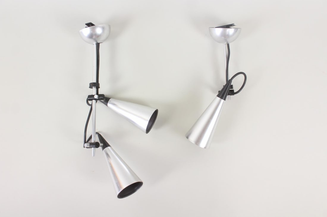 Pair of Cone Shaped Metal Ceiling Mount Light Fixtures: Pair of Mid-Century Modern Cone Shaped Metal Ceiling Mount Light Fixtures. Pair of chrome finish ceiling lights with cone shaped shades. One fixtures has 2 shades; the other has one. Dimensions are 13