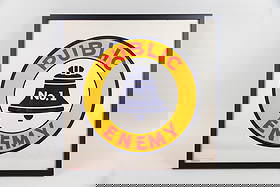 Pop Art "Public Enemy No. 1" Poster, Bob Cenedella, 1969: Pop Art Poster, "Public Enemy No. 1." A graphic poster that has a yellow circle with a blue bell and the text "PUBLIC" above the bell, "No. 1" inside the bell, and "ENEMY" below the bell, in red & blu