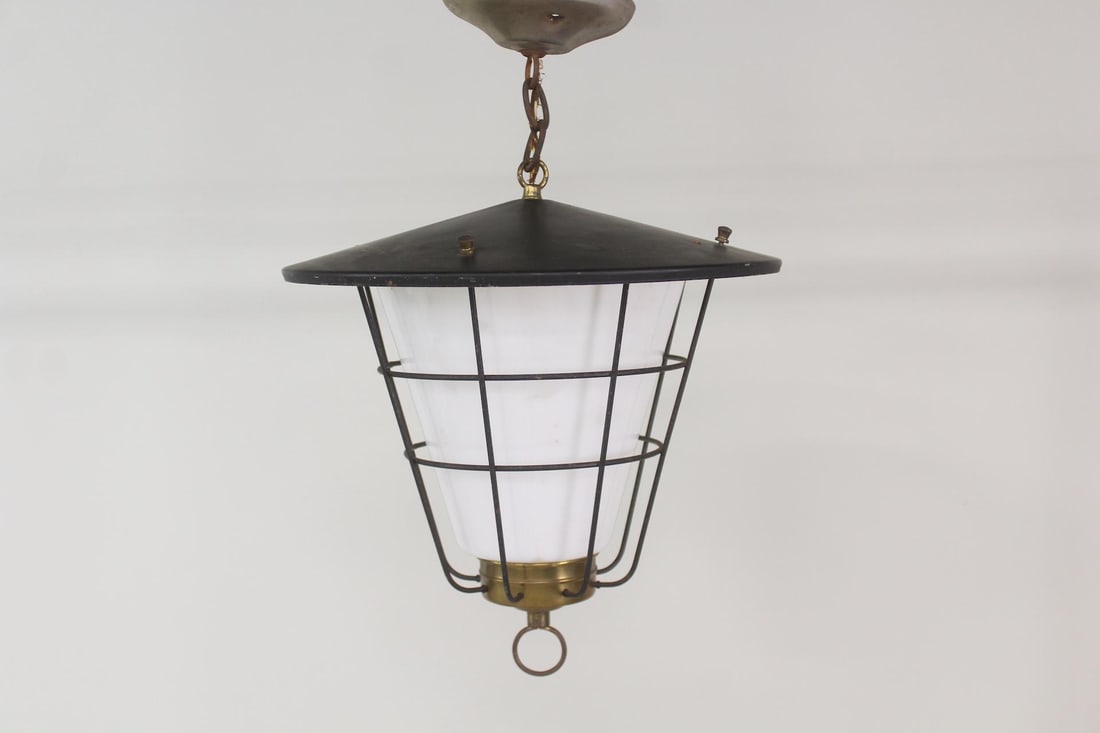 Black Metal & Milk Glass Hanging Lantern: Mid-Century Modern Black Metal & Milk Glass Hanging Lantern, Light Fixture. Hanging light with black metal cage and white milk glass shade. Includes note from 1974 showing age. Dimensions are 19 in h