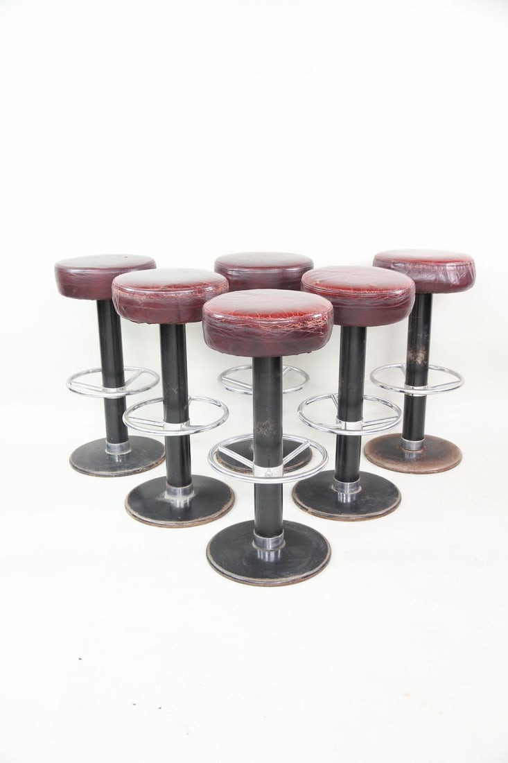 Set of 6 Danish Leather & Metal Bar Stools, Ole Rune Design: Set of 6 Mid-Century Modern Bar Stools, Ole Rune Design. Matching stools with black metal bases, chrome plated footrests, and circular oxblood leather padded seats. Labeled Ole Rune Design, Danmark on
