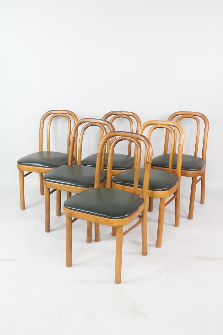 Set of 6 Mid-Century Modern Bentwood Chairs: Set of 6 Mid-Century Modern Bentwood Chairs possibly by Antonin Suman. Matching set of chairs with bentwood frames and dark green leather upholstered seats and backs. Empire State Chair Co. tags attac