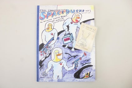 Daniel Johnston Signed "Space Ducks" Book & "Hi, How Are You?" Cassette