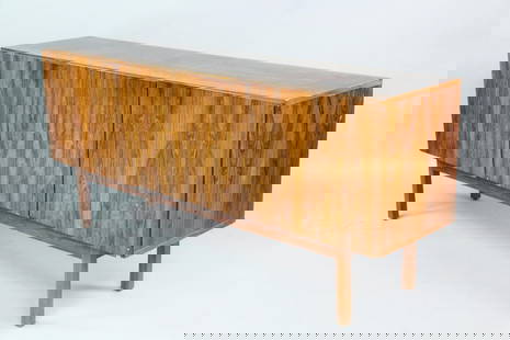 Danish Modern 3-Door Rosewood Credenza: Mid-Century Modern 3-Door Credenza Banquet. A long storage piece with six interior shelves and two shallow drawers. It has