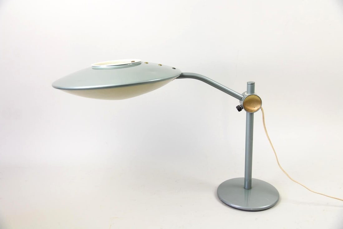 Dazor Mid-Century Modern Flying Saucer Desk Lamp: Atomic Space Age Metal Table Lamp, Model 2008. A fully adjustable desk or table lamp with distinctive "UFO" shape, it is made of light blue-gray painted metal with a fiberglass diffuser. Labeled Dazor