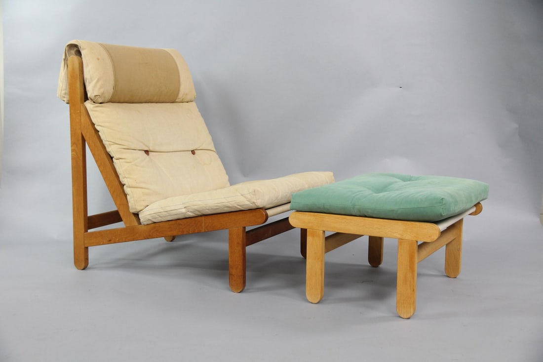 Bernt Peterson "Rag" Sling Lounge Chair & Ottoman: Mid-Century Modern Bernt Peterson Canvas & Wood Lounge Chair. A low-slung chair made of wood, likely oak, with a heavy canvas sling supporting the beige cushions. Unusual leather buttons (one missing.