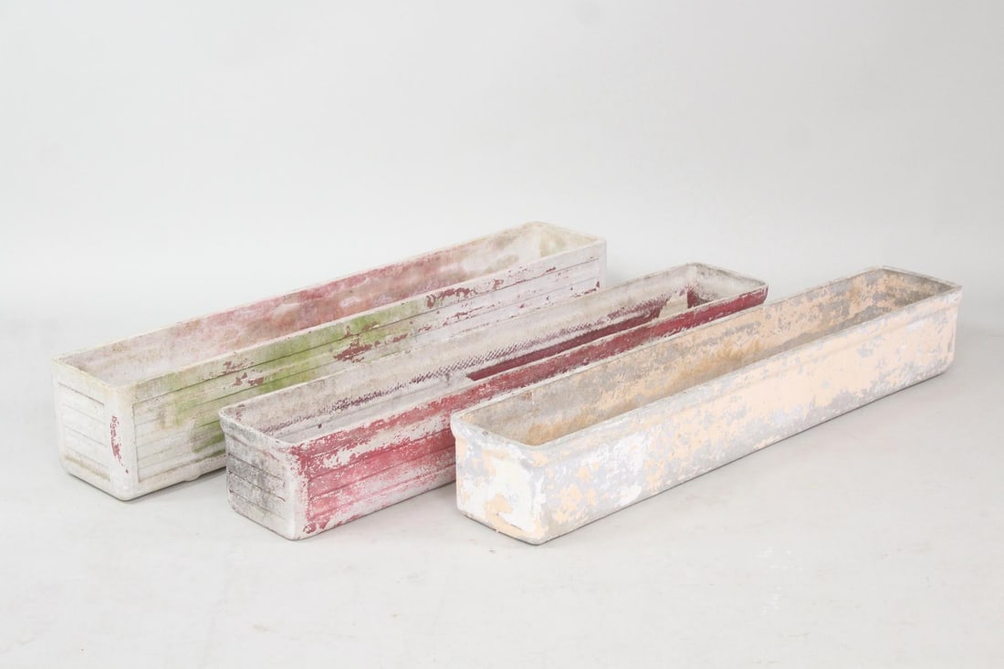 Lot of 3 Guhl Style White Fiber Cement Trough Planters: Lot of 3 Guhl Style White Fiber Cement Trough Planters. Three long trough planters in a thin fiber cement, somewhat in the style of Willy Guhl. Drainage holes at bottom. Dimensions are 8 in h x 47 in
