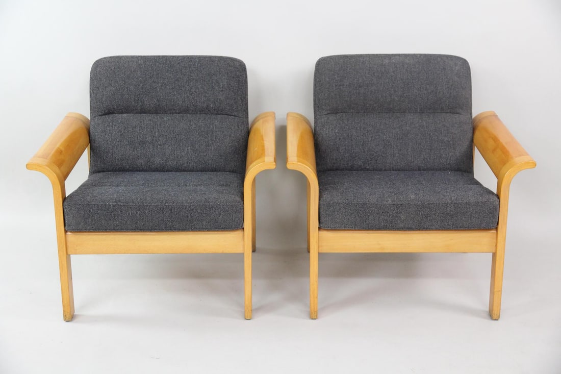 Pair of Botium Lounge Chairs; Rud Thygesen & Johnny Sørensen for Magnus Olesen: Pair of Danish Mid-Century Modern Botium Lounge chairs by Rud Thygesen & Johnny Sørensen for Magnus Olesen. Featuring bent beech and plywood frames and charcoal-colored fabric upholstery, with la
