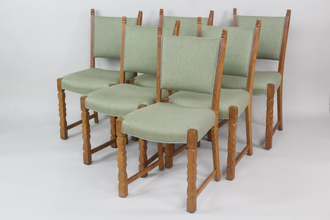 Set of 6 Danish Modern Oak Chairs, Henning Kjaernulf: Set of 6 Danish Modern Oak Dining Chairs, Manner of Henning Kjaernulf. Matching set of chairs with carved oak frames and light green upholstered seats and backs. In the manner of Henning Kjaernulf wit