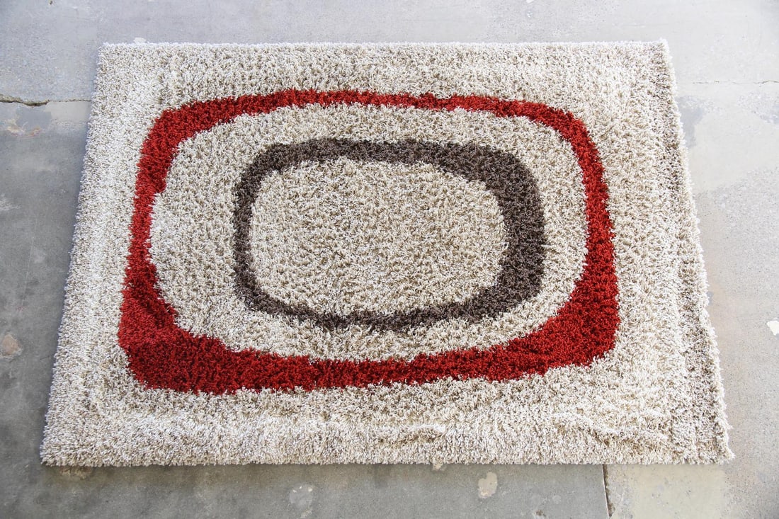 Contemporary Funky Shag Rug, 5 x 8 Ft.: Contemporary Shag Rug. A fun, textural rug with concentric, rounded rectangular shapes in red & brown on a beige background. Made in Belgium label attached to back. Dimensions are 96 in l x 60 in w x 