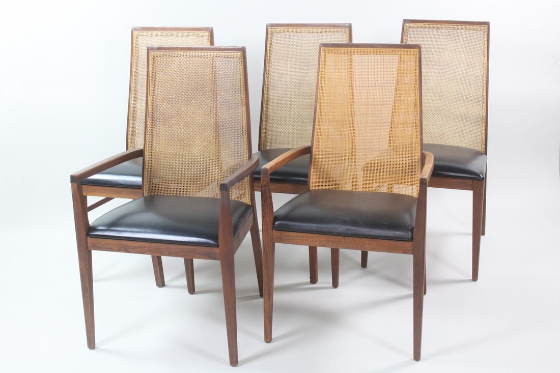 Set of 5 Walnut & Caned Back Dining Chairs, Dillingham: Mid-century Modern Set of 5 Walnut and Caned Back Dining Chairs, made by Dillingham. Wood construction with natural brown caning and black vinyl cushions. Label attached. Dimensions are 37 in h x 18.7