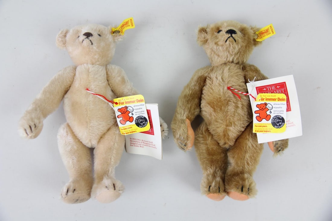 Pair of Margaret Woodbury Strong Museum Steiff Bears with Tags: Pair of Margaret Woodbury Strong Museum Steiff Bears with Tags. Two adorable 9 inch mohair jointed bears, in 2 colors, with Margaret Woodbury Strong Museum tags attached as well as Steiff ear buttons.