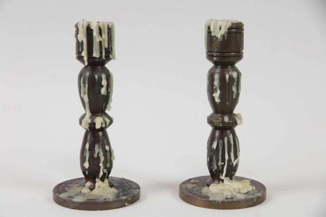 Pair of Brass Trench Art Candlesticks "Mine and Yours": Pair of Metal Candlesticks, Marked Roger & Helen Reynolds. Matching pair of solid and heavy metal candlesticks, possibly made of brass or bronze. Stamped on undersides Roger & Helen Reynolds JBA 1972.
