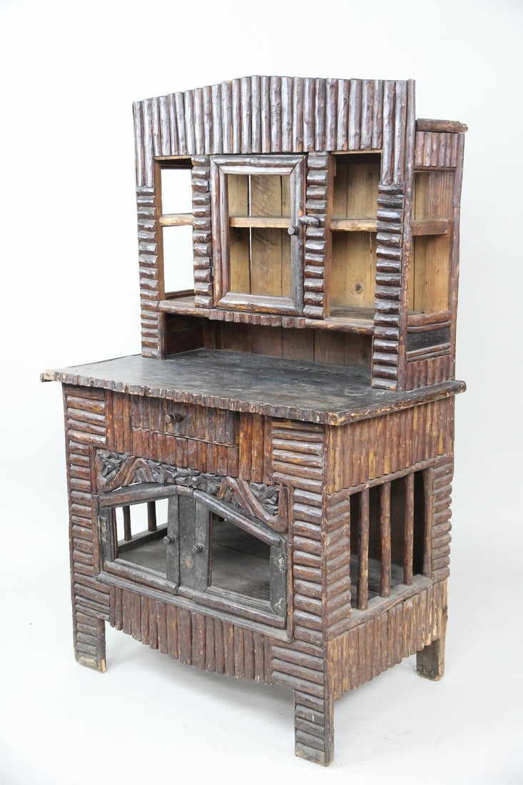 Primitive Adirondack Wooden Twig Cabinet, Hutch: Primitive Adirondack Wooden Twig Cabinet, Hutch.An unusual and skillfully constructed Adirondack hutch or cabinet. The bottom has open sides, two doors with carving above, and small drawer. Upper has