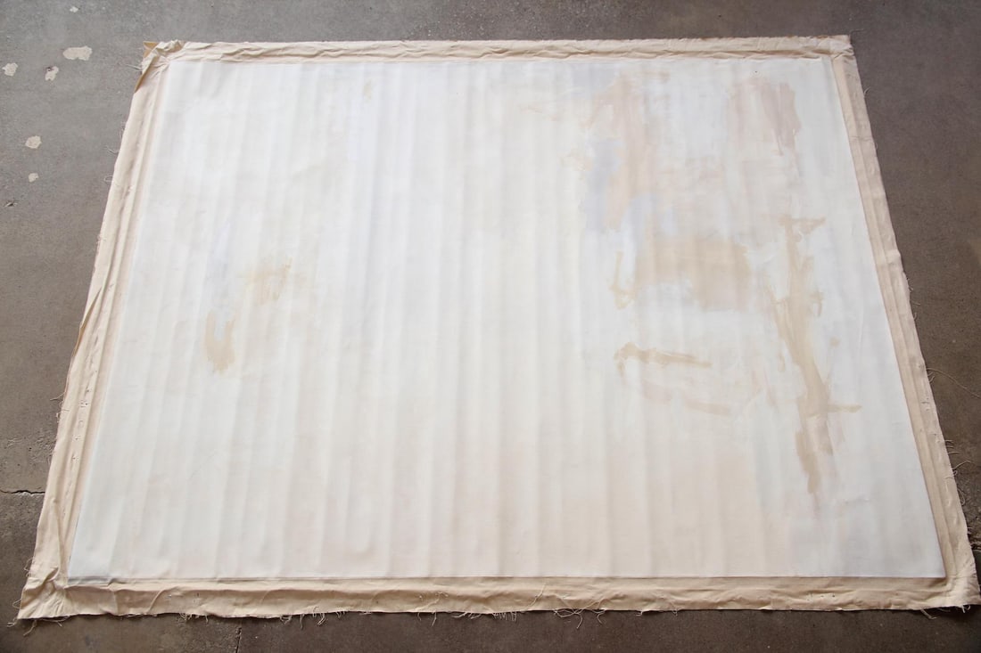 Large 8x6 Ft Minimalist White Color Field Painting: Large 8x6 Ft Minimalist White Color Field Painting. A minimalist painting with white color field and subtle gestural marks in pale tan and gray. Unstretched. Dimensions are 96in h x 72 in w. Condition