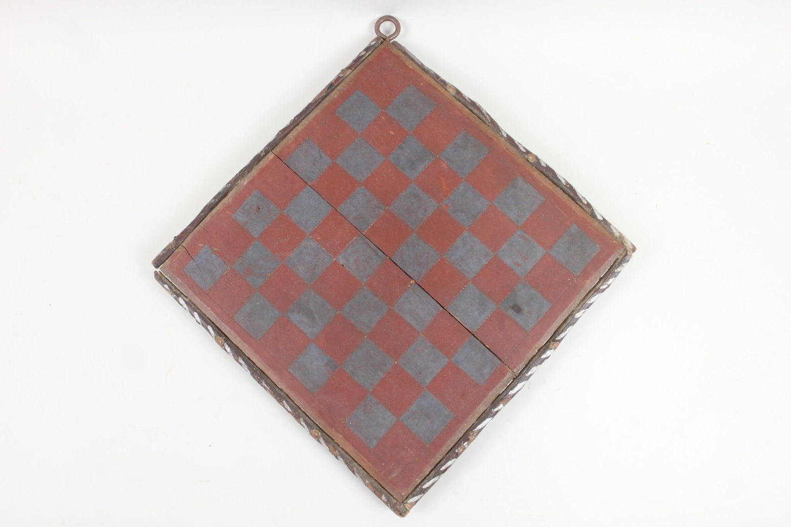 Folk Art Adirondack Twig Framed Checkerboard: Folk Art Red & Gray Checkerboard, Adirondack. Unique checkerboard is painted red and gray, with a twig frame with white accents around the edges. A hook is attached for wall display. Dimensions are 12